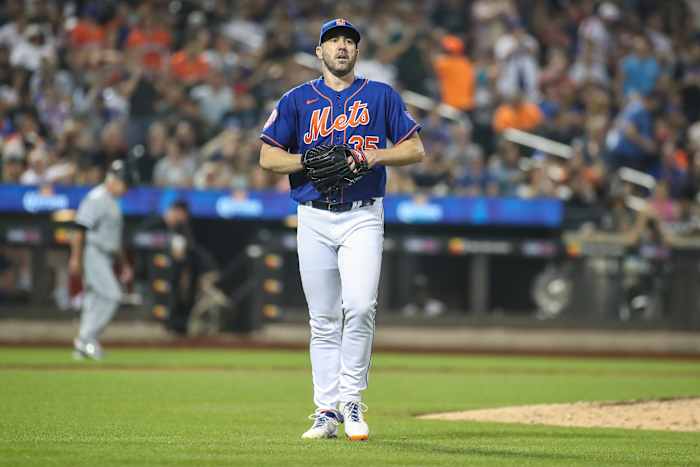 Justin Verlander holds his glove